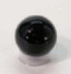 Black Obsidian Sphere with smooth, glassy texture, known for its protective and grounding qualities. At jujujems.