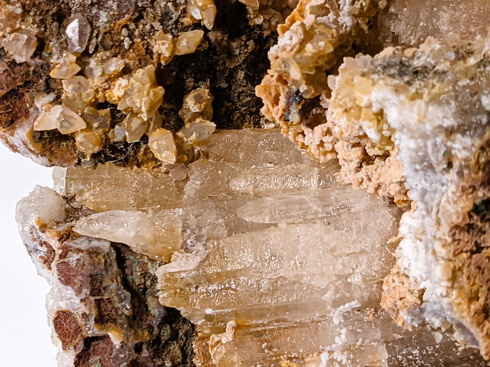 Thumbnail: Cluster of columnar quartz showcasing elongated, vertical crystal growth patterns.