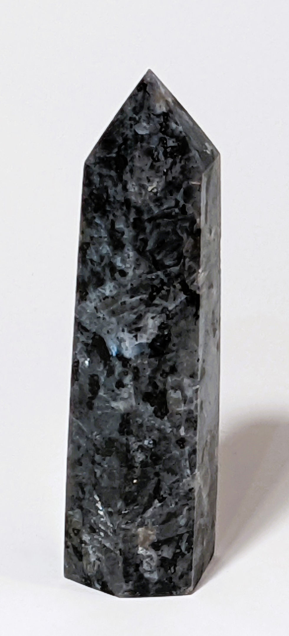Thumbnail: Dark and moody Larvikite Tower