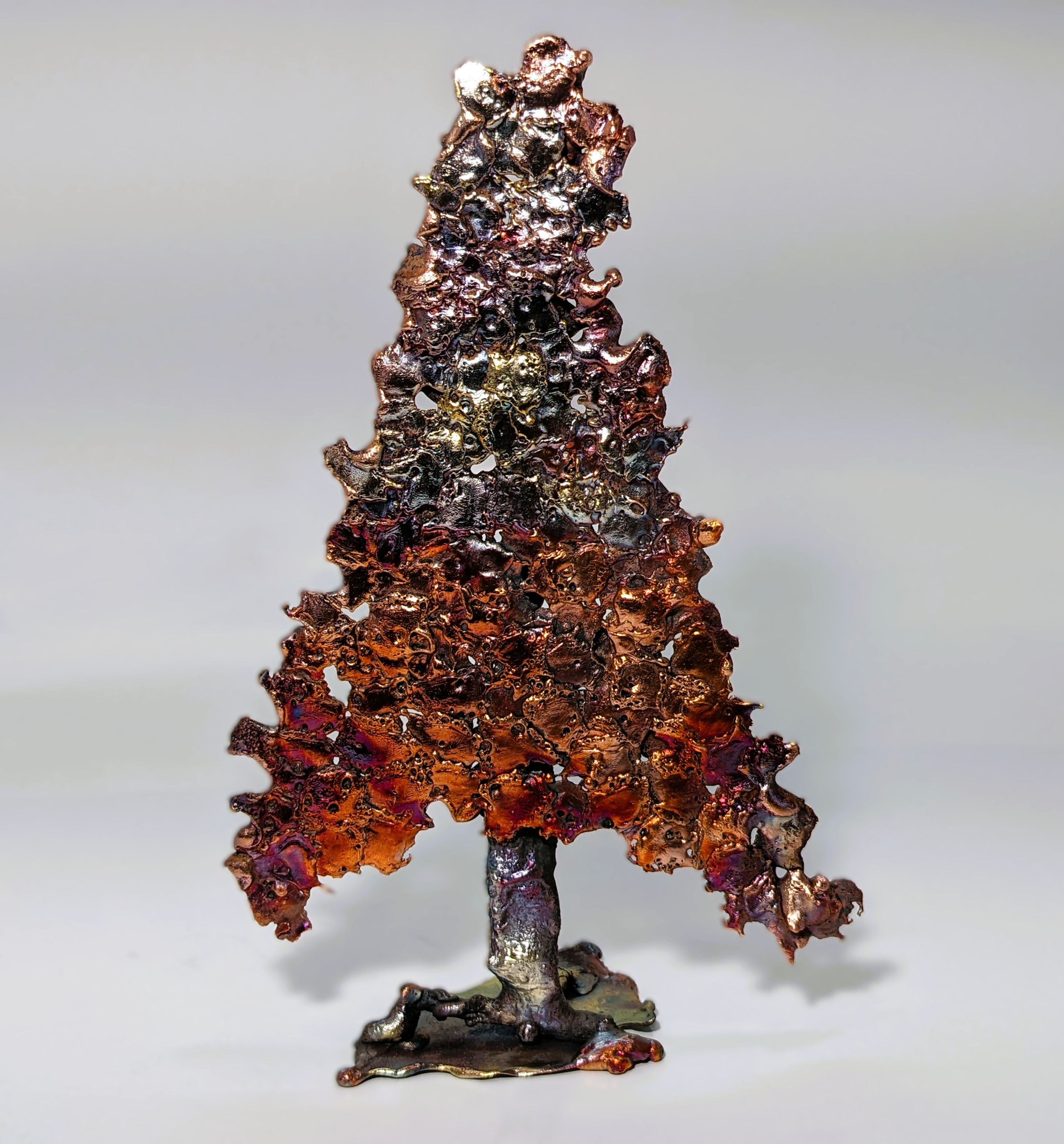 Copper evergreen tree with multicolor patina