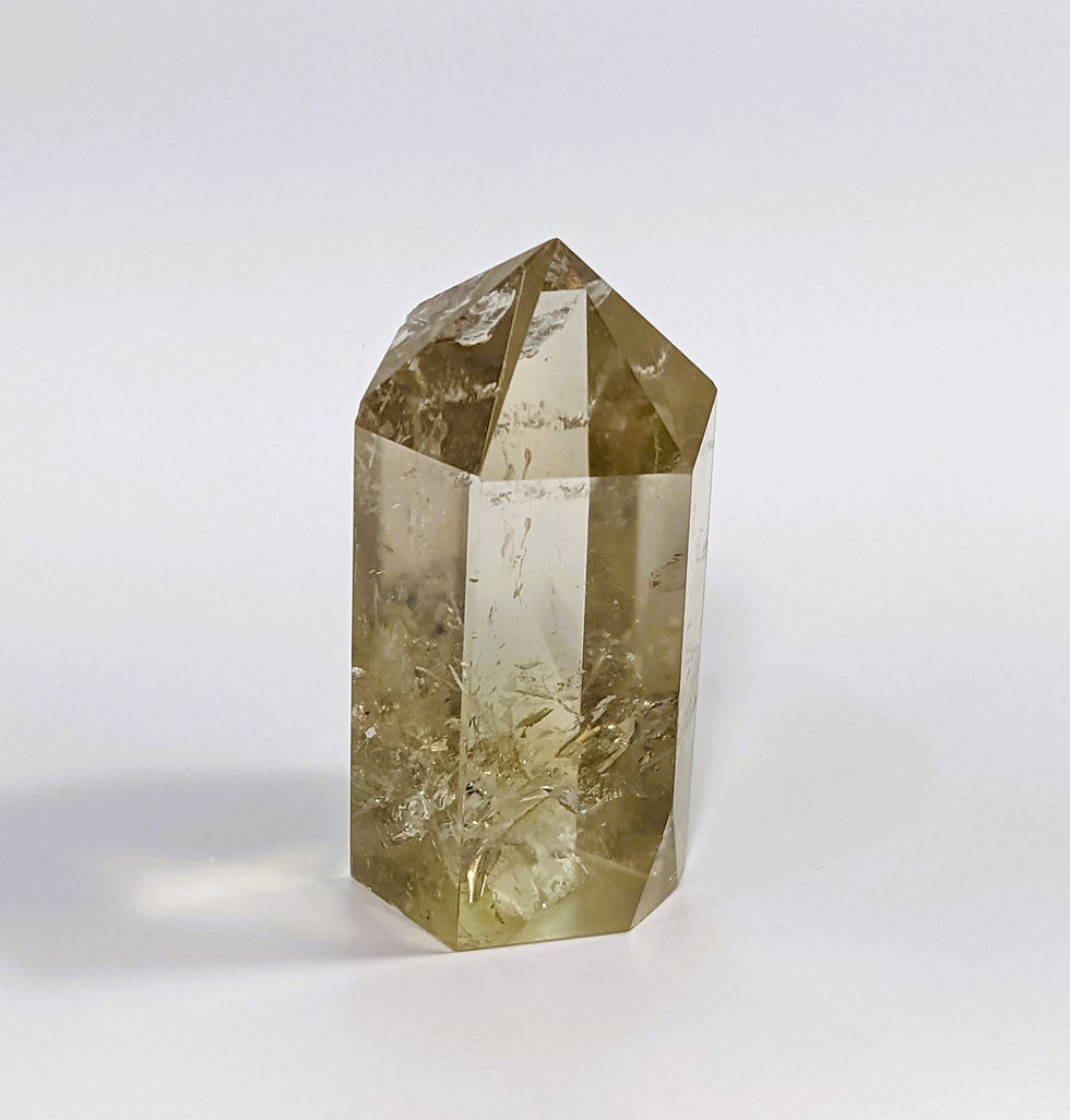 Thumbnail: Smoky Citrine with a blend of smoky brown and golden hues, known for grounding and abundance-attracting properties. jujujems