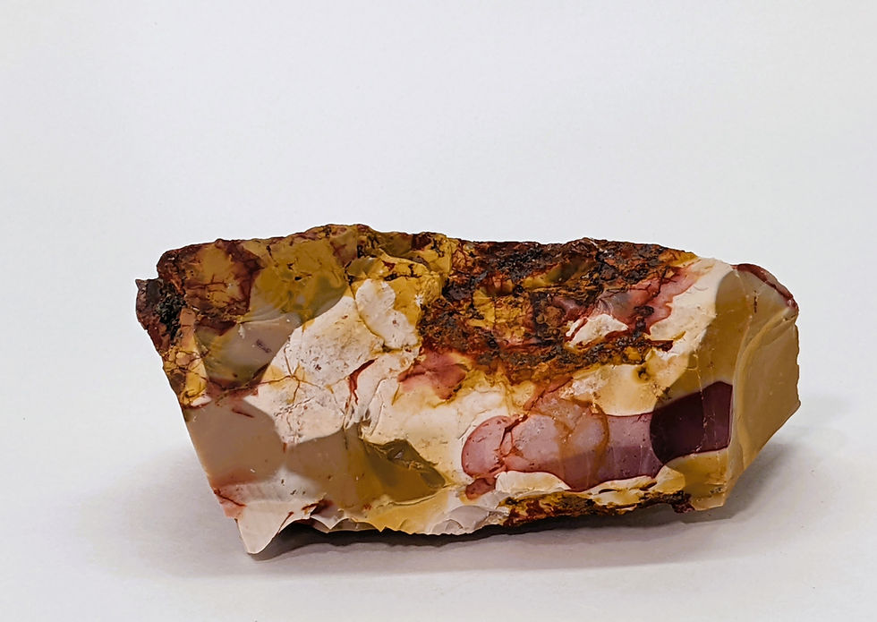 Thumbnail: Rough Mookaite with natural red and yellow bands.
