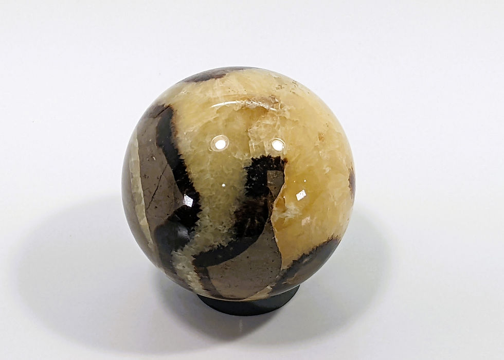 Thumbnail: Fossilized Septarian sphere with intricate calcite and aragonite formations