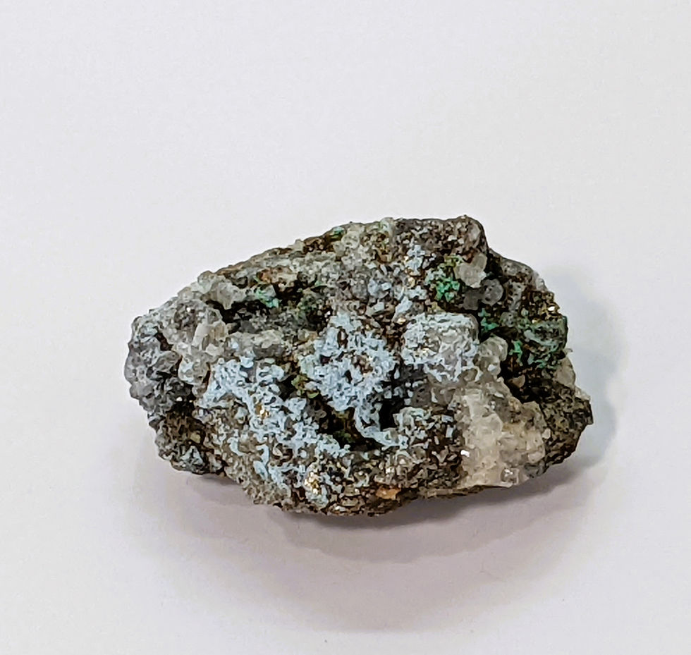 Thumbnail: Raw crystal cluster combining golden Pyrite, brassy Chalcopyrite, and colorful Bornite.