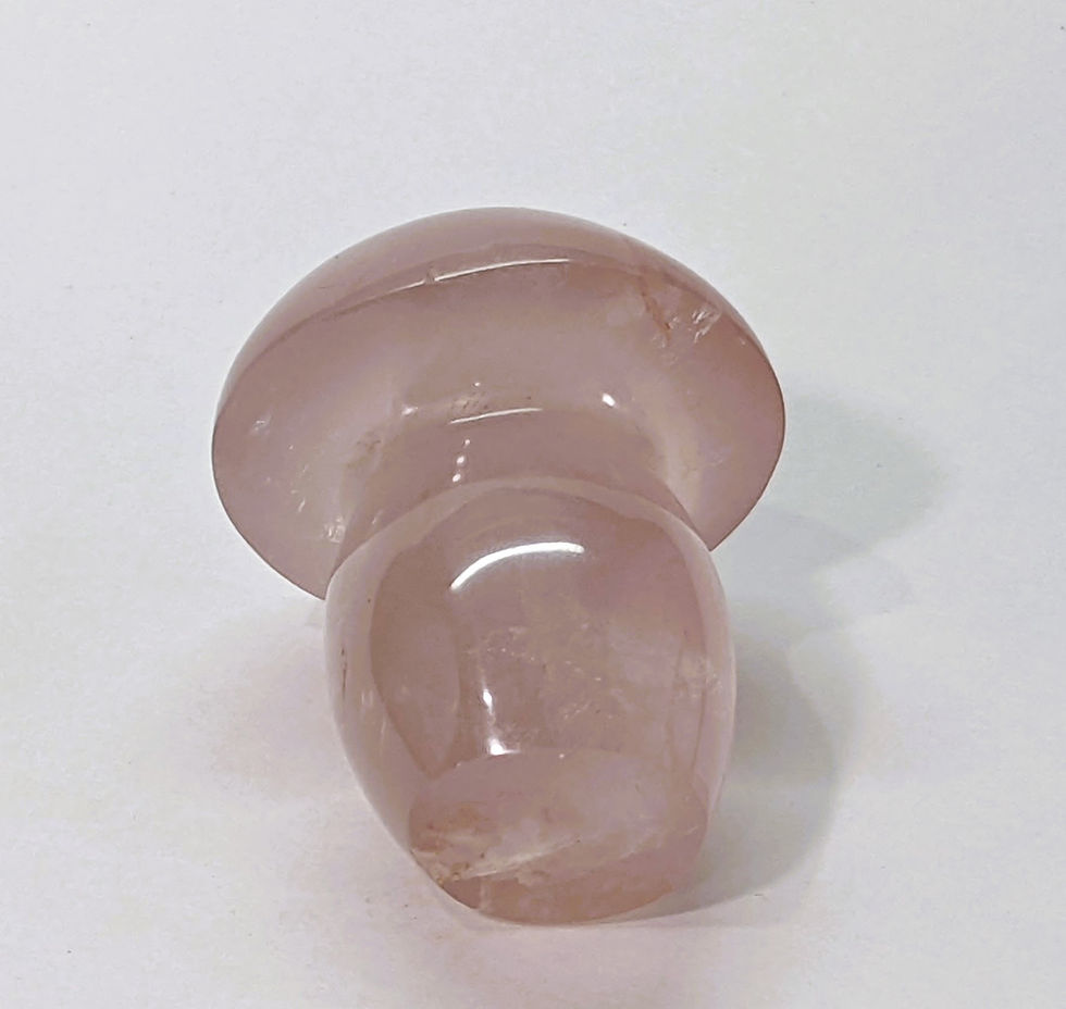 Thumbnail: Rose quartz mushroom carving featuring natural pink tones