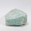 Thumbnail: Unpolished Amazonite stone showing earthy texture and aqua tones.