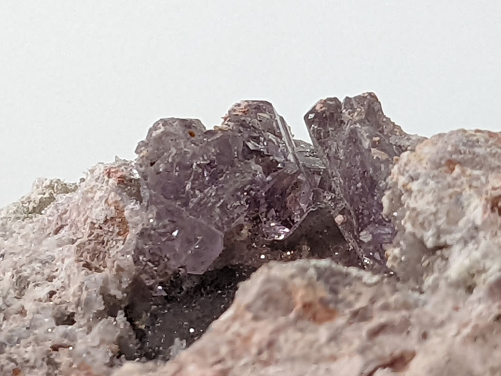 Thumbnail: Soft Amethyst geode with sparkling purple crystal interior