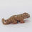 Thumbnail: Small soapstone lizard carving, symbolizing adaptability, awareness, and survival instincts.