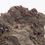 Thumbnail: Rough Garnet in Matrix specimen with deep red crystals set in natural stone.