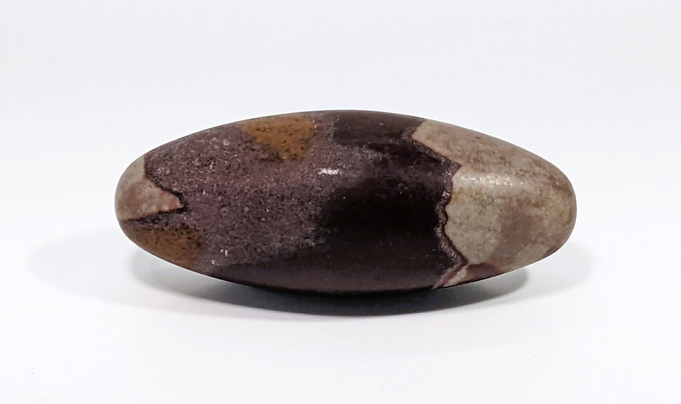 Thumbnail: Polished Shiva Lingam stones with smooth oval shape and natural banding