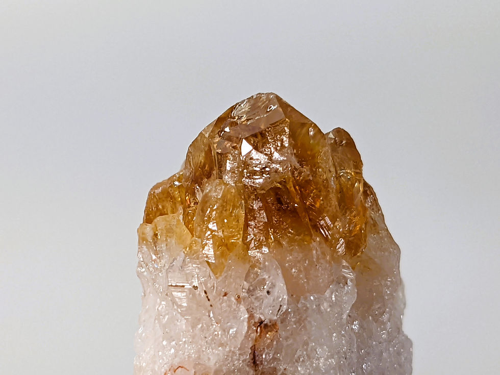 Thumbnail: Citrine with warm golden hues, known for its energizing and abundance-attracting properties. Available at jujujems.