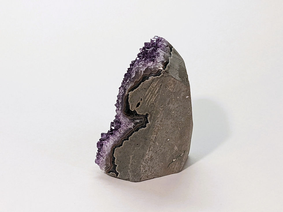Thumbnail: Amethyst cluster with purple crystals, bringing harmony and relaxation