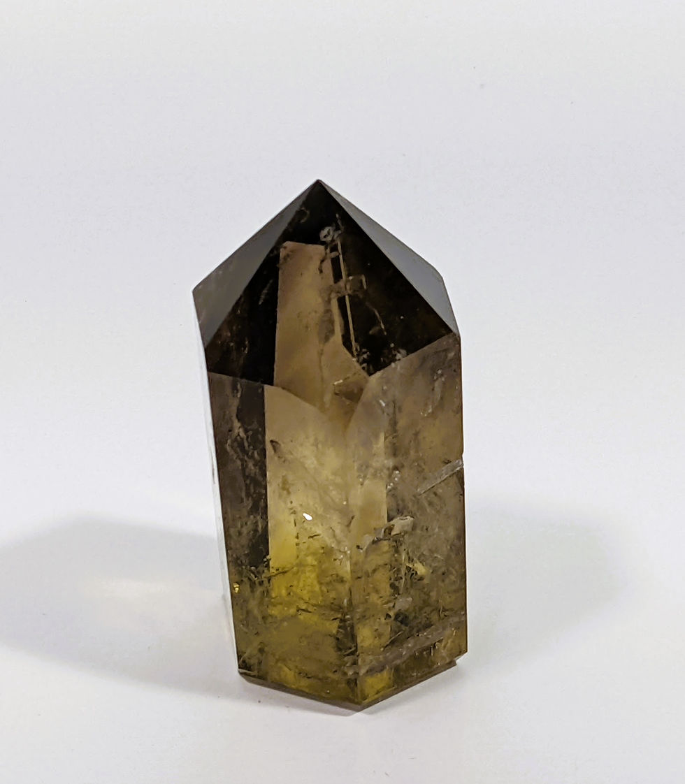 Thumbnail: Smoky Citrine with a blend of smoky brown and golden hues, known for grounding and abundance-attracting properties. jujujems