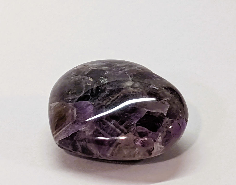Thumbnail: Amethyst heart with rich purple tones, known for calming energy and spiritual clarity. At jujujems.