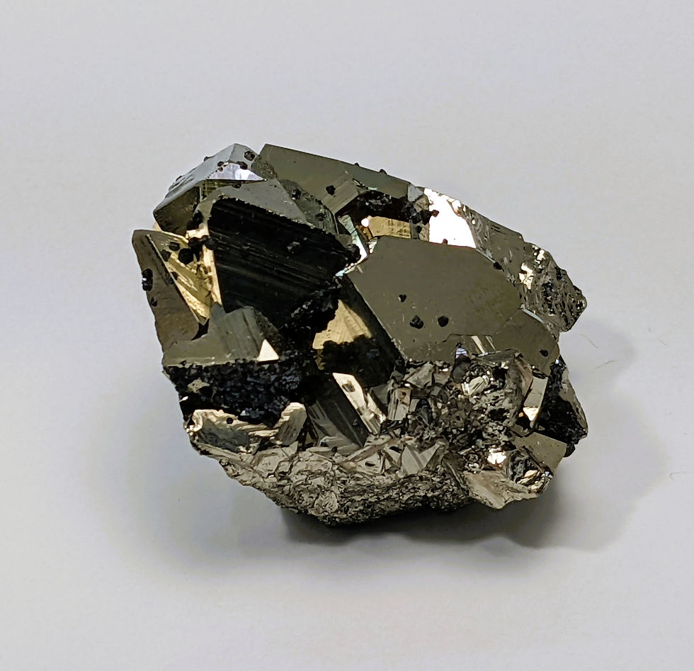 Thumbnail: Octahedral Pyrite with natural triangular crystal form