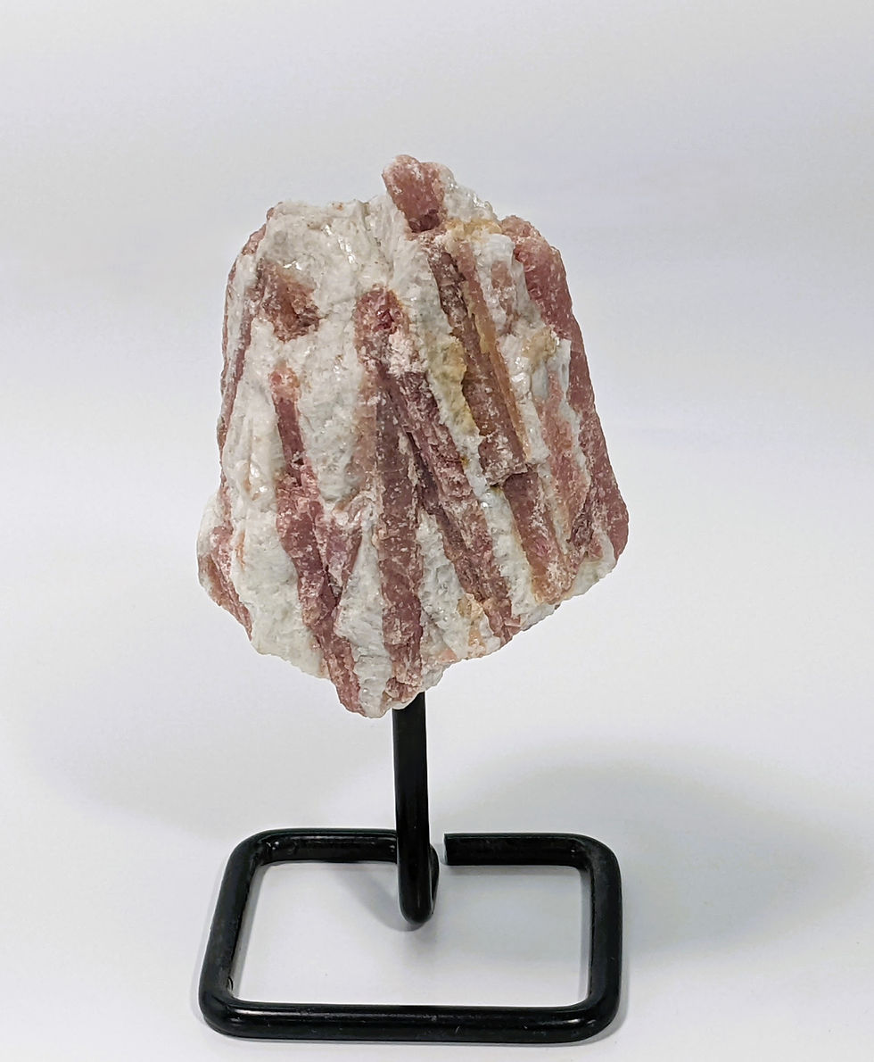 Pink Tourmaline heart with natural pink inclusions on built-in stand.