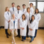 team of 10 members wearing lab coat.jpg