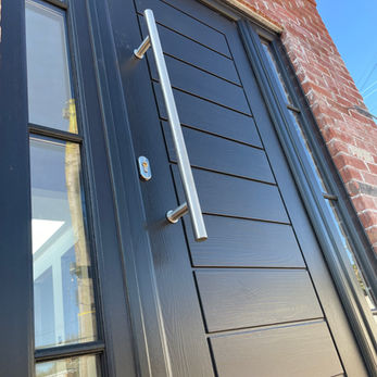 Solidor 'Palmer Solid' Composite Door in Schwarzbraun Black with matching side flags, astragal bar and stainless steel long handles. Wow !