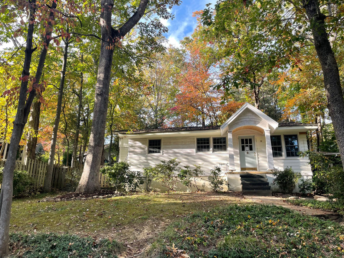 Professional asphalt shingle roof installation on a house in Black Mountain, NC. Enhance the beauty and durability of your home with our expert roofing services.