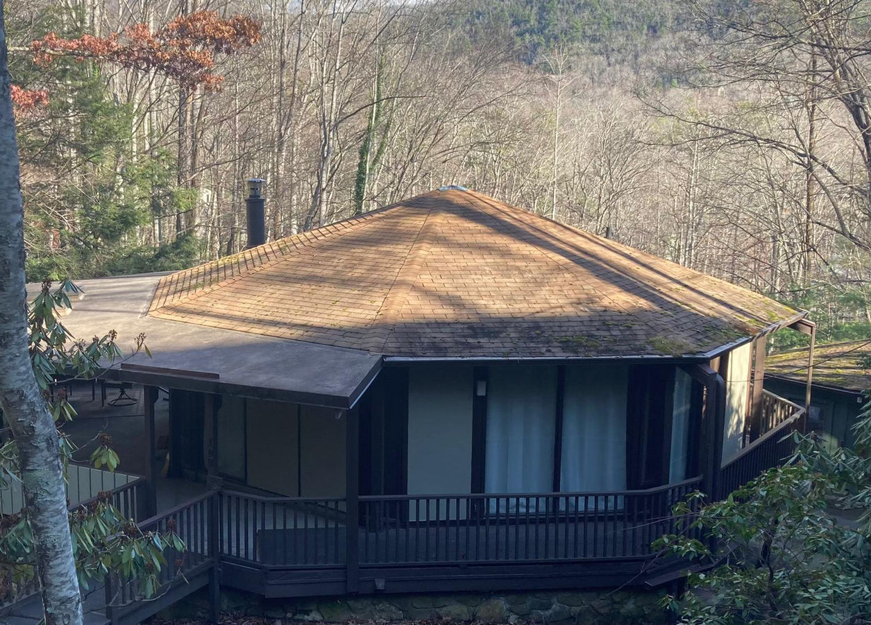 Elevate the beauty and protection of your Black Mountain, NC rotunda home with our premium asphalt shingle roof replacement services. Our skilled roofing professionals specialize in preserving the unique architectural features of rotunda homes while delivering exceptional durability and performance.

With meticulous attention to detail and the use of top-quality materials, we ensure a seamless roof replacement process that enhances both aesthetics and functionality. Safeguard your home against the unpredictable North Carolina weather with our reliable asphalt shingles, designed to withstand wind, rain, and UV exposure.

Our experienced team is committed to providing a stress-free experience, minimizing disruptions to your daily life. We take pride in delivering exceptional craftsmanship, leaving you with a beautiful, long-lasting roof that complements the distinct character of your rotunda home.

Trust our locally based experts for your asphalt shingle roof replacement needs in Black Mountain, NC. Contact us today to schedule a personalized consultation and take the first step towards enhancing your rotunda home's curb appeal and protection.