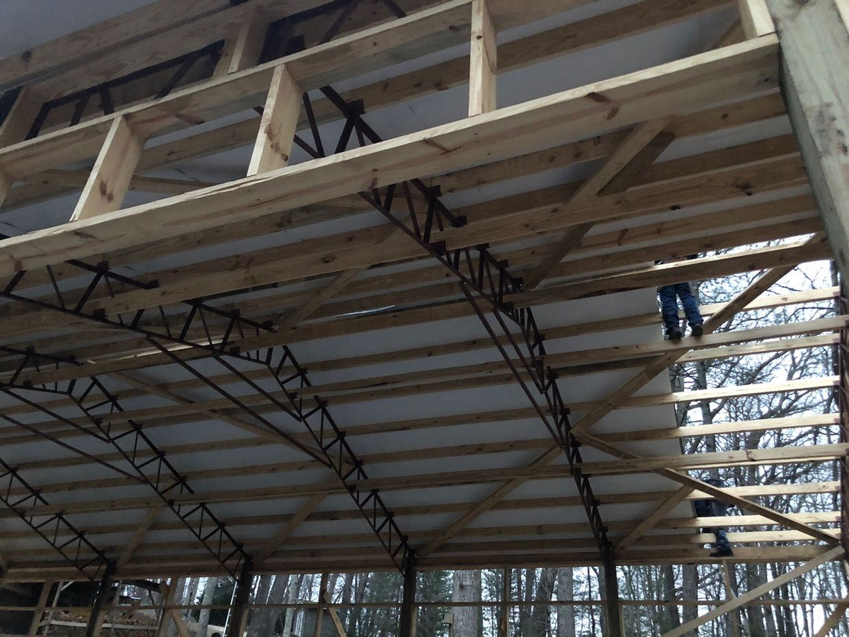 Professional installation of galvanized metal roof, fascia, and soffit on a house in Black Mountain, NC. Enhance your home's durability and aesthetics with our expert roofing services.