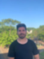 Portrait of the Asheville, NC Native roofing company owner Maxi Viera, a trusted expert in the industry, dedicated to delivering top-notch roofing services.