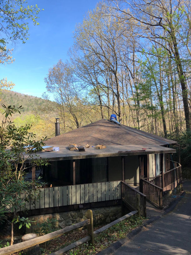 Elevate the beauty and protection of your Black Mountain, NC rotunda home with our premium asphalt shingle roof replacement services. Our skilled roofing professionals specialize in preserving the unique architectural features of rotunda homes while delivering exceptional durability and performance.

With meticulous attention to detail and the use of top-quality materials, we ensure a seamless roof replacement process that enhances both aesthetics and functionality. Safeguard your home against the unpredictable North Carolina weather with our reliable asphalt shingles, designed to withstand wind, rain, and UV exposure.

Our experienced team is committed to providing a stress-free experience, minimizing disruptions to your daily life. We take pride in delivering exceptional craftsmanship, leaving you with a beautiful, long-lasting roof that complements the distinct character of your rotunda home.

Trust our locally based experts for your asphalt shingle roof replacement needs in Black Mountain, NC. Contact us today to schedule a personalized consultation and take the first step towards enhancing your rotunda home's curb appeal and protection.