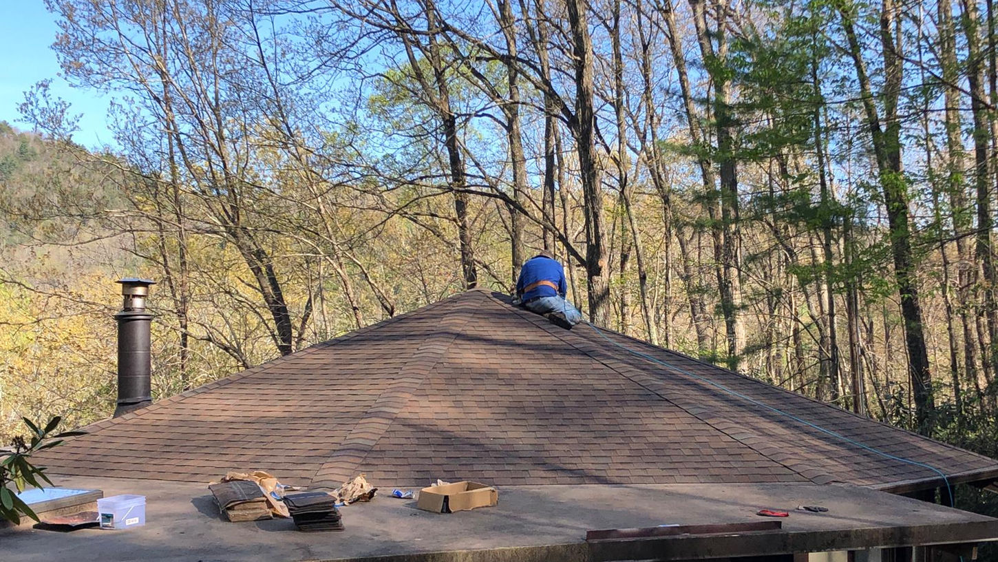 Elevate the beauty and protection of your Black Mountain, NC rotunda home with our premium asphalt shingle roof replacement services. Our skilled roofing professionals specialize in preserving the unique architectural features of rotunda homes while delivering exceptional durability and performance.

With meticulous attention to detail and the use of top-quality materials, we ensure a seamless roof replacement process that enhances both aesthetics and functionality. Safeguard your home against the unpredictable North Carolina weather with our reliable asphalt shingles, designed to withstand wind, rain, and UV exposure.

Our experienced team is committed to providing a stress-free experience, minimizing disruptions to your daily life. We take pride in delivering exceptional craftsmanship, leaving you with a beautiful, long-lasting roof that complements the distinct character of your rotunda home.

Trust our locally based experts for your asphalt shingle roof replacement needs in Black Mountain, NC. Contact us today to schedule a personalized consultation and take the first step towards enhancing your rotunda home's curb appeal and protection.