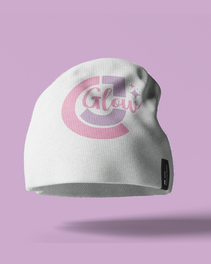 a white beanie with the word glow on it