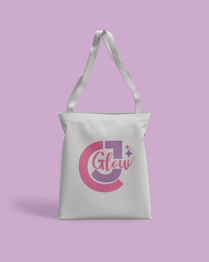 a white tote bag with the word glow on it