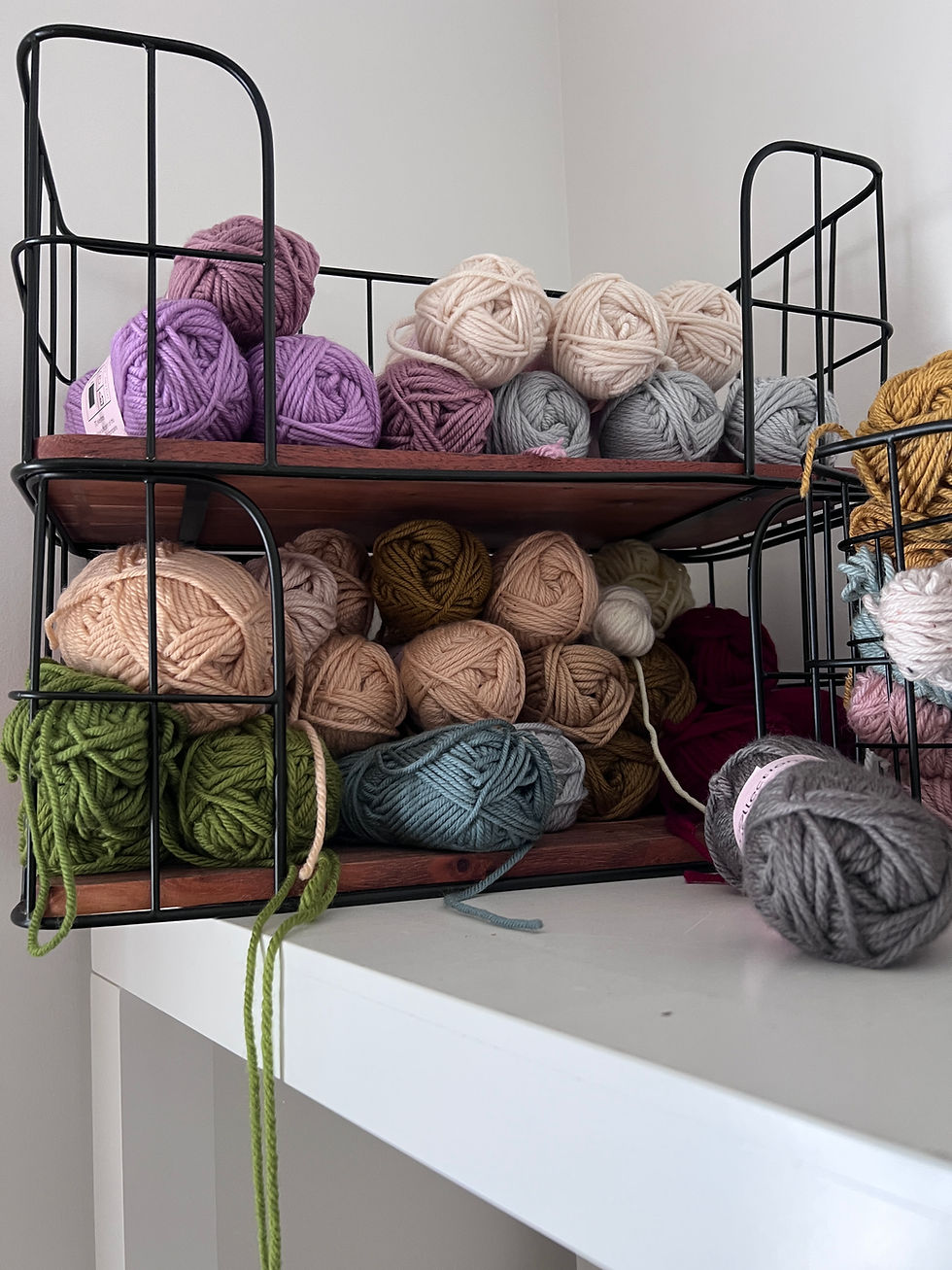 Four balls of yarn purchased from Nundle Woollen Mill while keeping the studio small before moving.