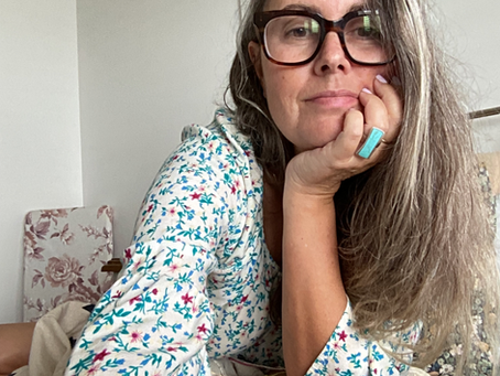 Me on my bed reflective after crocheting