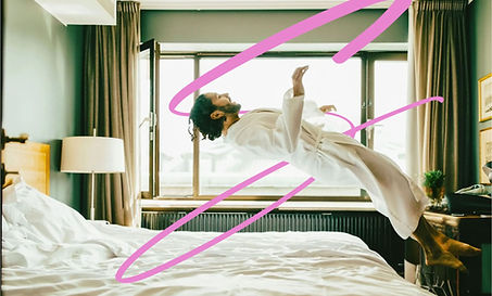 SAVVY Collective Management, man falling onto hotel bed