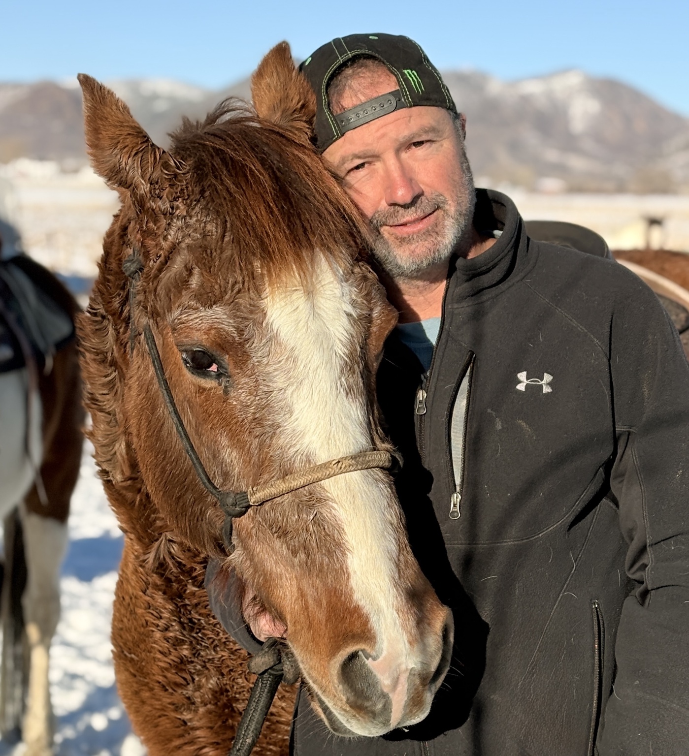 Todd Whitehead with a horse at the ranch
