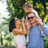 family-with-little-daughter-together-park-life-insurance.jpg