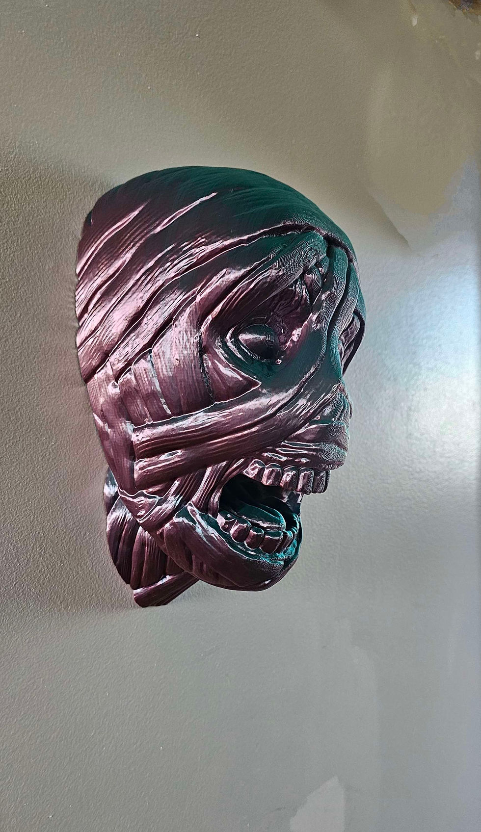 Thumbnail: Zombie head headset holder 