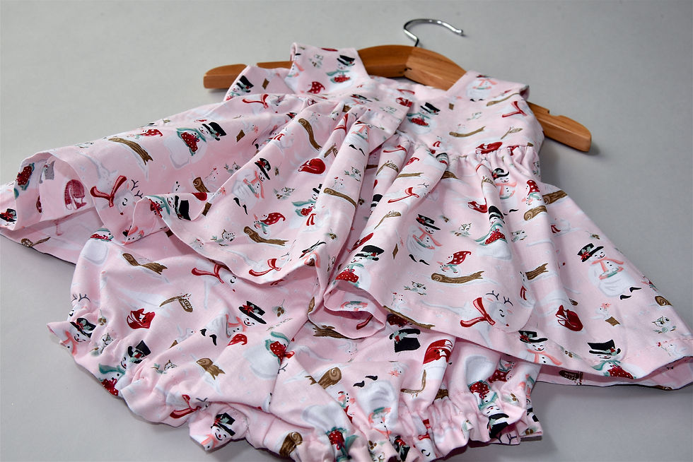 Miniatura: Close up view of Mr. and Mrs. Snowman print baby dress by 5L2F