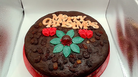 CHRISTMAS RUM FRUIT CAKE LIGHTLY DECORATED
