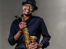 Smiling Man with Saxophone