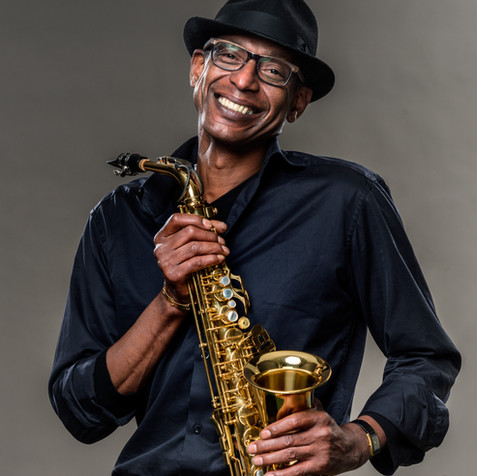Smiling Man with Saxophone