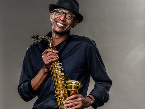 Smiling Man with Saxophone