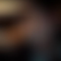 two women dancing whilst drinking cocktails in rooftop bar at dj event in nyc