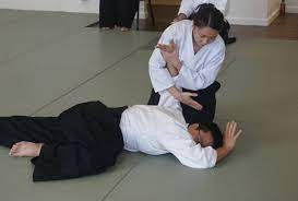 Aikido shoulder pin.