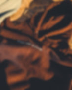 Brown hoodie with white text