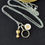 Thumbnail: Long Clarinet Key Charm Love Necklace