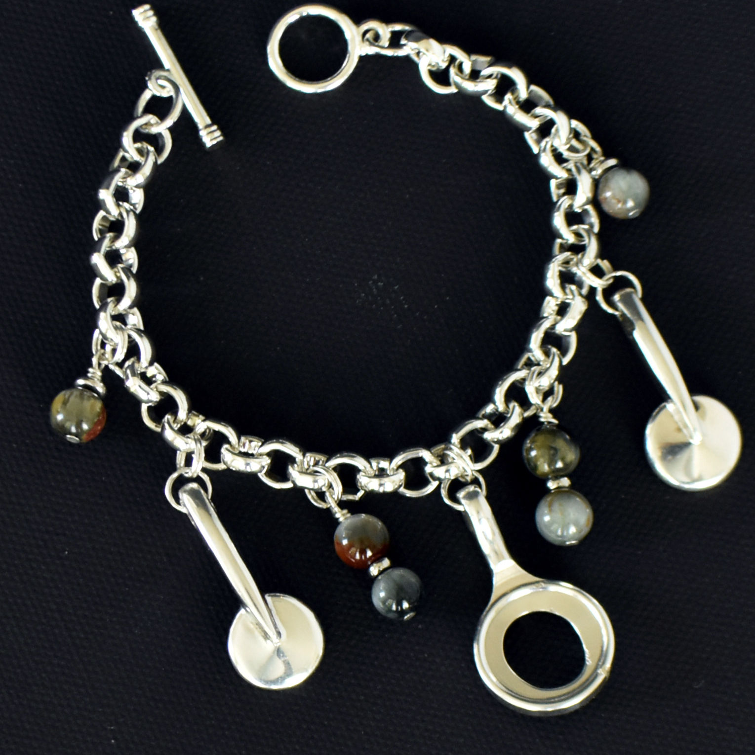 Sterling silver plated bassoon key bracelet with 3 authentic keys and Hawk's Eye beads. 7.125 inches. Handcrafted. 30% suppor