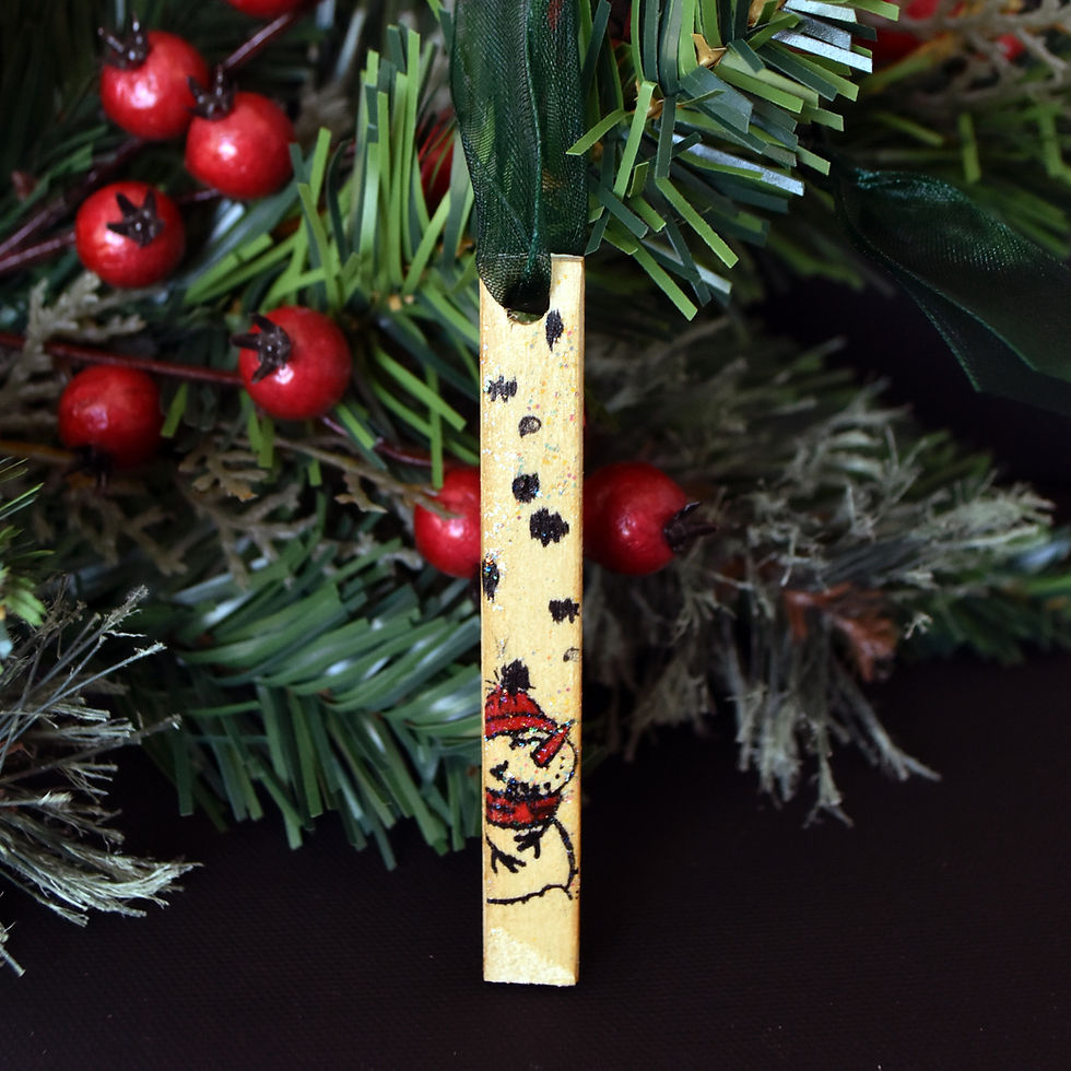 Handmade white organ key Christmas ornament with cascade of jingle bells on front and snowman with snowflakes on reverse, han