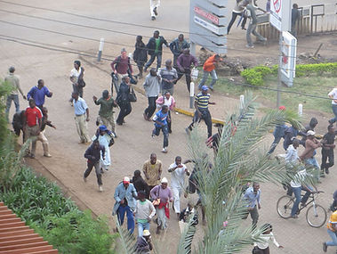 1280px-Crowd_fleeing_sounds_of_gunfire_near_Westgate.jpg