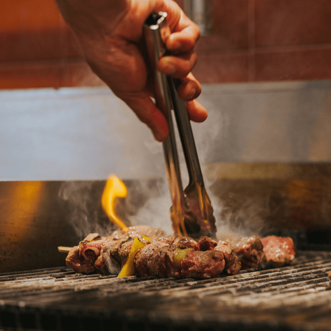 Souvla_Grilling Meat.png