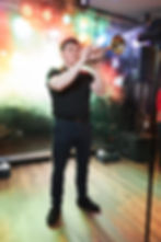 Trompeter bei einem Auftritt mit hochwertiger Live-Musik für Events.